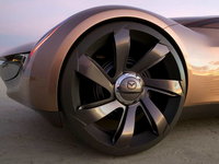 Click image for larger version

Name:	2006-mazda-nagare-concept-scn-net-093.jpg
Views:	154
Size:	35.1 KB
ID:	189853