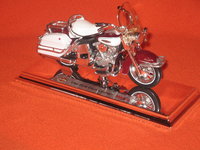 Click image for larger version

Name:	Harley Davidson - 1966 FLH Electra Glide .jpeg
Views:	118
Size:	1.51 MB
ID:	1521721