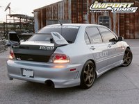 Click image for larger version

Name:	0611_impp_02z+2003_mitsubishi_lancer_evolution_viii+right_rear_view.jpg
Views:	23
Size:	70.2 KB
ID:	1524375