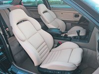 Click image for larger version

Name:	160_0608_et_13z+1995_BMW_318is+Interior_Seats.jpg
Views:	98
Size:	49.3 KB
ID:	1636915