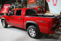 Click image for larger version

Name:	112_2007_chicago_auto_show_140z+2008_dodge_dakota+rear_three_quarter_view.jpg
Views:	46
Size:	96.5 KB
ID:	213511