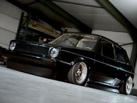 Click image for larger version

Name:	eurp_1006_02_o+1980_vw_golf+deep_berg_cup_style_spoilers.jpg
Views:	69
Size:	55.1 KB
ID:	1536050