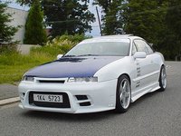Click image for larger version

Name:	opel_calibra_white_01_b.jpg
Views:	37
Size:	40.3 KB
ID:	184661