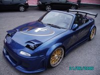 Click image for larger version

Name:	normal_NonStockColorMiata-036.jpg
Views:	71
Size:	51.5 KB
ID:	1498426
