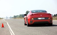 Click image for larger version

Name:	112_0910_02z+2010_ferrari_california+rear.jpg
Views:	1513
Size:	48.2 KB
ID:	999330