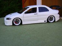 Click image for larger version

Name:	toma_lancer_evo_7_3.jpg
Views:	36
Size:	29.9 KB
ID:	1897801