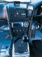 Click image for larger version

Name:	0409it_02z+2000_Nissan_BNR34_Skyline+Interior_View_Center_Console.jpg
Views:	26
Size:	54.2 KB
ID:	1526106
