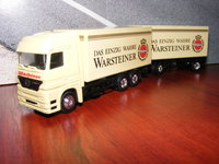 Click image for larger version

Name:	Mercedes Actros + tandem Warsteiner 1-87.JPG
Views:	244
Size:	1.49 MB
ID:	1397749