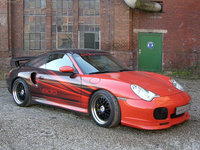 Click image for larger version

Name:	Edo-Porsche_996_Turbo_Red-Black_2006_1600x1200_wallpaper_02.jpg
Views:	79
Size:	636.9 KB
ID:	644355