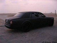 Click image for larger version

Name:	matte-black-rolls-royce-phantom_6.jpg
Views:	5616
Size:	52.8 KB
ID:	722534