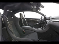 Click image for larger version

Name:	2008-Mercedes-Benz-CLK-63-AMG-Black-Series-Interior-Side-View-1280x960.jpg
Views:	53
Size:	306.9 KB
ID:	476168