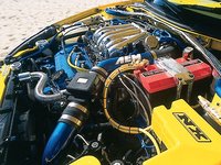 Click image for larger version

Name:	caep_0107_14_z+2001_mitsubishi_eclipse_gt_spyder+engine_bay[1].jpg
Views:	63
Size:	96.9 KB
ID:	1108060