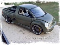 Click image for larger version

Name:	vw_new_beetle_vwbeetlepickup1.jpg
Views:	91
Size:	49.9 KB
ID:	1882690