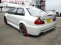 Click image for larger version

Name:	Body-Kit-Mitsubishi-Lancer-2-171830.jpg
Views:	1375
Size:	48.1 KB
ID:	785357