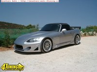 Click image for larger version

Name:	body-kit-honda-s2000-a6d14c699a60f0b59-594-0-1-95-1.jpg
Views:	34
Size:	51.5 KB
ID:	2112462