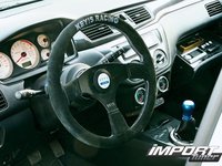 Click image for larger version

Name:	0704_impp_05z+2005_mitsubishi_lancer_evolution_8_gsr+steering_wheel.jpg
Views:	33
Size:	69.2 KB
ID:	1530125