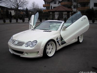 Click image for larger version

Name:	07FAB_DESIGN_Mercedes_SL_Class_Mega_Wing_Wide_Body_3.jpg
Views:	580
Size:	139.9 KB
ID:	86453