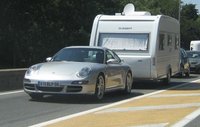 Click image for larger version

Name:	Porsche%20997%20caravan%2002.jpg
Views:	675
Size:	32.6 KB
ID:	538072