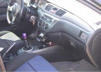 Click image for larger version

Name:	Mitsubishi-Lancer-Evolution-VIII-4-210858.jpg
Views:	346
Size:	32.6 KB
ID:	637995