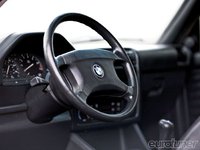 Click image for larger version

Name:	eurp_1102_04_o+1990_bmw_325i+steering_wheel.jpg
Views:	104
Size:	43.3 KB
ID:	2030961