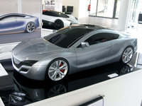 Click image for larger version

Name:	Mazda-Yuuga-Coupe-1.jpg
Views:	505
Size:	180.8 KB
ID:	1043863