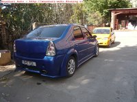 Click image for larger version

Name:	Dacia-Logan-1400-5-358657.jpg
Views:	175
Size:	248.3 KB
ID:	1197941