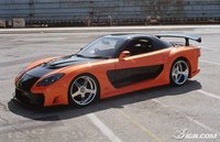 Click image for larger version

Name:	the-fast-and-the-furious-tokyo-drift-car-of-the-day-veilside-rx-7-20060613114300333.jpg
Views:	274
Size:	87.9 KB
ID:	114370