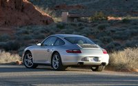 Click image for larger version

Name:	112_0702_13z+2006_porsche_911_carrera_4+rear_three_quarter_view.jpg
Views:	162
Size:	61.1 KB
ID:	216087