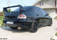 Click image for larger version

Name:	Mitsubishi-Lancer-Evo-VIII-3-171688.jpg
Views:	306
Size:	165.1 KB
ID:	567484