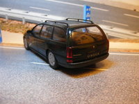 Click image for larger version

Name:	Vauxhall Omega Caravan - SCHUCO 1-43 5.JPG
Views:	28
Size:	1.38 MB
ID:	2027193