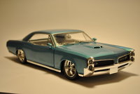 Click image for larger version

Name:	Pontiac GTO '66.JPG
Views:	104
Size:	1.22 MB
ID:	1380297