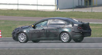 Click image for larger version

Name:	3-2010-Opel-Vectra.jpg
Views:	176
Size:	100.0 KB
ID:	265223