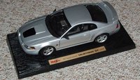 Click image for larger version

Name:	ford_mustang_gt_1999_35th_anniversary.jpg
Views:	118
Size:	55.9 KB
ID:	1816611
