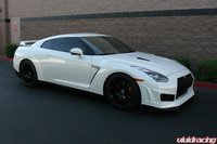 Click image for larger version

Name:	vivid-racing-nissan-gt-r-vorsteiner-carbon-fiber-body-kit.jpg
Views:	602
Size:	45.5 KB
ID:	1136669