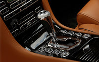 Click image for larger version

Name:	112_0802_10z+2009_bentley_brooklands+center_console.jpg
Views:	134
Size:	104.4 KB
ID:	446590