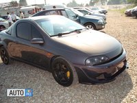 Click image for larger version

Name:	opel-tigra-1196946.jpg
Views:	126
Size:	65.1 KB
ID:	1592902