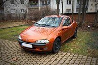 Click image for larger version

Name:	Opel___Tigra_Orange metallic.JPG
Views:	51
Size:	63.2 KB
ID:	2963600