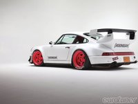 Click image for larger version

Name:	eurp-1203-02+1991-porsche-911-turbo+rear-view.jpg
Views:	30
Size:	33.5 KB
ID:	2465693