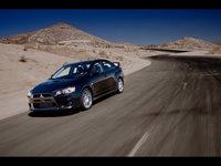 Click image for larger version

Name:	2008-Mitsubishi-Lancer-Evolution-Black-Front-Angle-Speed-1024x768.jpg
Views:	116
Size:	220.3 KB
ID:	948257