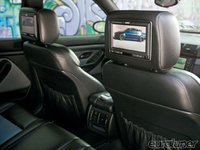 Click image for larger version

Name:	eurp_1008_07_o+2000_bmw_m5+back_seats.jpg
Views:	76
Size:	55.2 KB
ID:	1620141