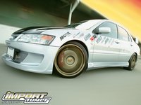 Click image for larger version

Name:	0611_impp_03z+2003_mitsubishi_lancer_evolution_viii+left_front_view.jpg
Views:	27
Size:	43.1 KB
ID:	1524376