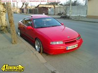 Click image for larger version

Name:	Opel-Calibra-2000.jpg
Views:	242
Size:	60.0 KB
ID:	1921522