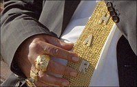 Click image for larger version

Name:	mr_zaharia_gold_tie_closeup_460x292.jpg
Views:	60
Size:	57.0 KB
ID:	603103