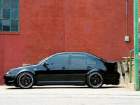 Click image for larger version

Name:	0706et_10_z+2001_vw_jetta_glx+side_view_parked.jpg
Views:	368
Size:	75.4 KB
ID:	368877