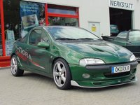 Click image for larger version

Name:	2038_4_opel_tigra_tuning_aez_olymp_001.jpg
Views:	23
Size:	42.2 KB
ID:	2767006