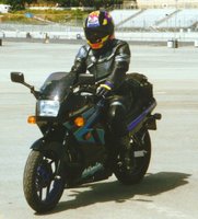 Click image for larger version

Name:	1996 Kawasaki Ninja EX-250R F12 black 02 purple.jpg
Views:	252
Size:	64.7 KB
ID:	389853