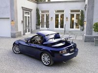 Click image for larger version

Name:	2007-mazda-mx-5-top-rear-left-with-hardtop-foldingjpg.jpg
Views:	115
Size:	82.9 KB
ID:	515323