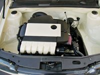 Click image for larger version

Name:	eurp_1101_03_o+1997_volkswagen_golf_20+shaved_engine_bay.jpg
Views:	132
Size:	64.2 KB
ID:	2009532