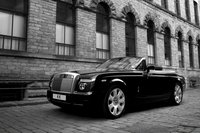 Click image for larger version

Name:	rolls-royce-drophead-coupe-with-kahn-dark-mist-wheels_3.jpg
Views:	610
Size:	382.4 KB
ID:	746545