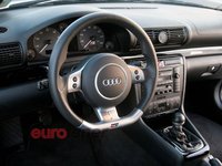 Click image for larger version

Name:	eurp_0810_15_z+2001_s4_avant_and_2000_audi_s4+b7_rs4_steering_wheel.jpg
Views:	80
Size:	55.8 KB
ID:	1232816